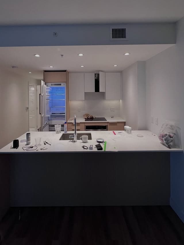 Condo kitchen before move-out clean