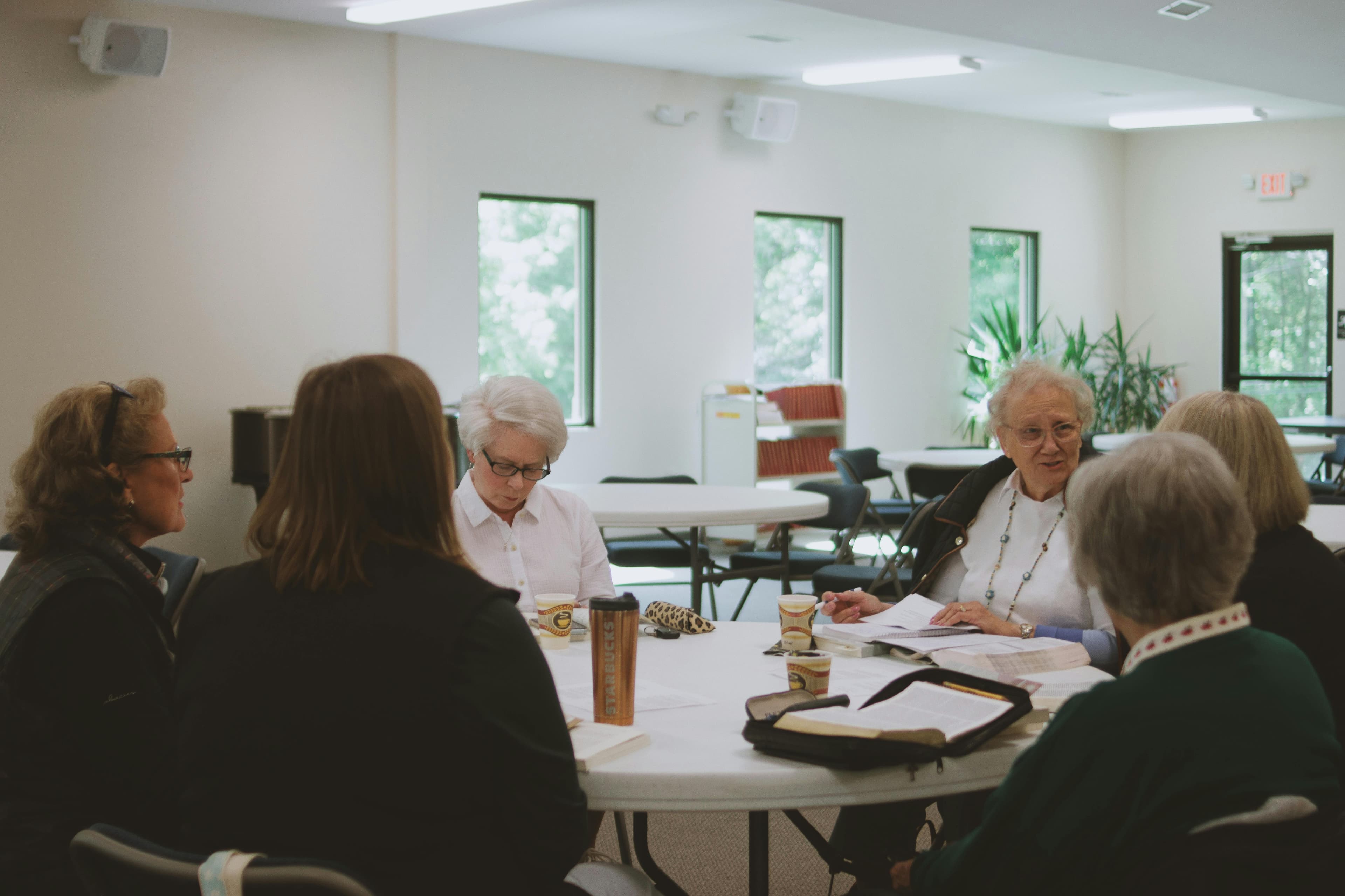 Joyful elderly resident with caregiver